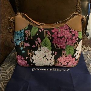 Dooney & Bourke shoulder bag, medium size. Very stylish. Brand new with tags